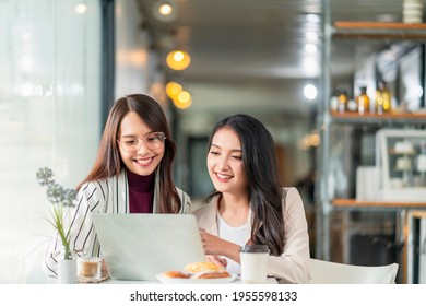 asian female creative agency casual meeting discussion working with laptop coffee work from home with client co worker,asian young woman with window and water rain drop raining background