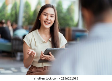 asian female creative agency digital nomad working anywhere discuss with friend about her project at cafe restaurant new working lifestyle,asian female creative agency casual meeting client customer - Powered by Shutterstock