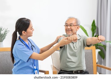 Asian Female Doctor Advice Elderly Patient To Physiotherapist To Exercise Stretching Muscle At Home.Smiling Nurse Helping Senior Patient Workout Exercise To Build Muscle Strong.Physiotherapist Nursing