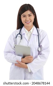 Asian female doctor with beautiful smile standing holding a laptop computer on a white background. concept of medical services in hospitals. Clipping Path