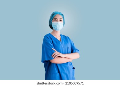 Asian Female Doctor In Blue Surgical Gown, Isolated Background