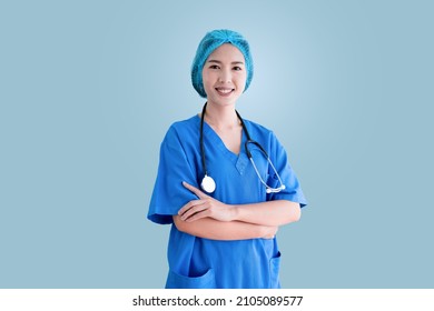 Asian Female Doctor In Blue Surgical Gown, Isolated Background