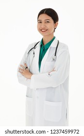 Asian Female Doctor Portrait In Uniform Has Stethoscope On Shoulder. Confident And Warmth Looks Isolated In White Background.