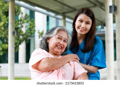Asian Female Doctor Treats Elderly Patient Stock Photo 2173415853 ...