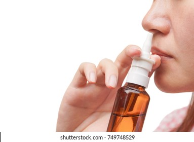 Asian Female Doing Nasal Irrigation By Using Normal Saline Solutiona Spray Isolated With Copy Space To Add Text