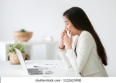 Asian Female Employee Excited With Unexpected Online Lottery Win, Promotion Email, Company Sales Growth On Market, Happy Worker Reading Good Online News At Laptop. Concept Of Reward, Achievement