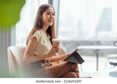 Asian Female Freelance Digital Nomad Career Happiness Workation Cheerful Smiling Working Online With Smart Device Tablet Smartphone Abroad Occupation Project Work Anywhere New Frameless Lifestyle Cafe