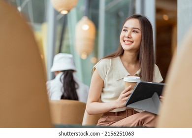 Asian Female Freelance Digital Nomad Career Happiness Workation Cheerful Smiling Working Online With Smart Device Tablet Smartphone Abroad Occupation Project Work Anywhere New Frameless Lifestyle Cafe