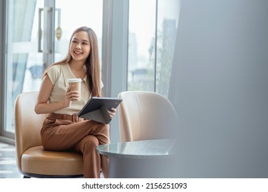 Asian Female Freelance Digital Nomad Career Happiness Workation Cheerful Smiling Working Online With Smart Device Tablet Smartphone Abroad Occupation Project Work Anywhere New Frameless Lifestyle Cafe