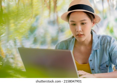 Asian Female Freelance Digital Nomad Millennial Gen Y  Lifestyle Relax Casual Working With Laptop Outdoor At Balcony Near The Beach,asian Female Working Anywhere New Lifestyle Working While Travel