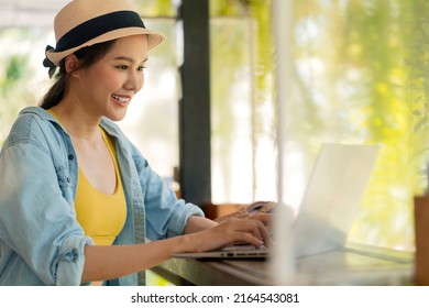 Asian Female Freelance Digital Nomad Millennial Gen Y Lifestyle Relax Casual Working With Laptop Outdoor At Balcony Near The Beach,asian Female Working Anywhere New Lifestyle Working While Travel