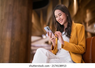 Asian Female Freelance Digital Nomad Career Happiness Workation Cheerful Smiling Working Online With Smart Device Tablet Smartphone Abroad Occupation Project Work Anywhere New Frameless Lifestyle Cafe