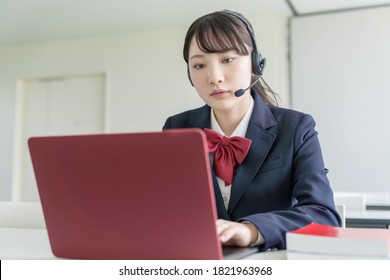 Asian Female High School Student Taking Online Class.