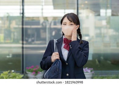 Asian Female High School Student Wearing A Mask. Infection Prevention.