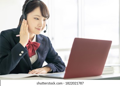 Asian Female High School Student Taking Online Class.