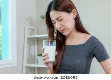 Asian Female Holding Glass Milk Stomach Ache After Drinking Milk. Symptom Lactose Allergy And Calcium. Cow's Milk Allergy.