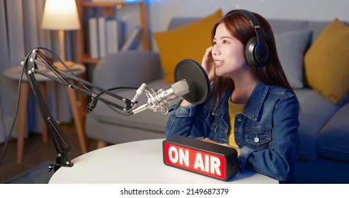 Asian Female Internet Celebrity Have Live Stream Or Podcast With On Air Light Sign At Home