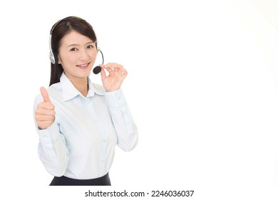 asian female operator in white background - Shutterstock ID 2246036037