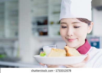 Asian Female Pastry Chef Concept. Patisserie.