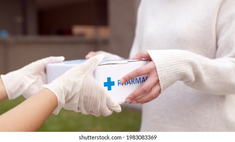 Asian Female Patient Receive Medication Package Box Free First Aid From Pharmacy Hospital Delivery Service At Home Wear Glove In Telehealth, Telemedicine Healthcare Insurance Online Concept.