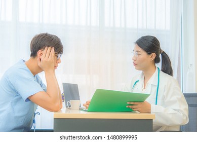 Asian female pats are describing the results of recommendations for health care methods to prevent diseases for male patients in hospitals through medical concepts. - Shutterstock ID 1480899995