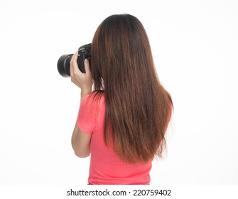 Asian Female Photographer Making Pictures, Back View, Isolated On White.