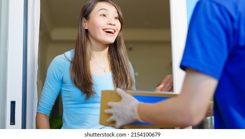 Asian Female Receive Medication Package Box From Pharmacy Hospital Delivery Service At Home