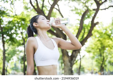 Asian Female Sport Girl In Park