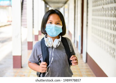 Asian Female Students Wearing Masks To Prevent Coronavirus (COVID 19) In A Rural School On The First Day Of The Semester. She Came To School On The First Day Because It Was The Opening Day.