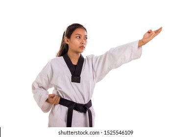 Asian female taekwondo fighter attacking with her left hand using four fingers strike technique, isolated on white background - Powered by Shutterstock