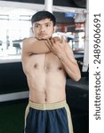 Asian Figther Man In Sportswear Stretching Arms With Holding Elbow Before Workout