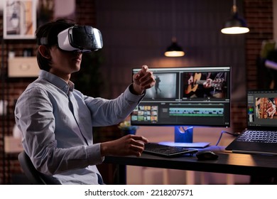 Asian Film Maker Editing Multimedia Video On Computer, Using Vr Glasses And Software App. Creating Movie Footage Or Montage With Color Grading On Media Production User Interface.