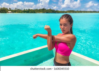 Asian Fitness Girl Stretching Doing Fit Exercise At Luxury Overwater Bungalow Villa Swimming Pool On Blue Ocean Travel Exotic Vacation Resort.