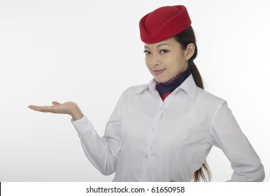 Asian Flight Attendant On White Background