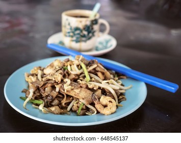 Asian Food - Fried Kway Teow And A Cup Of Coffee
KwayTeow Is A Type Of Noddle In Flatten Shape