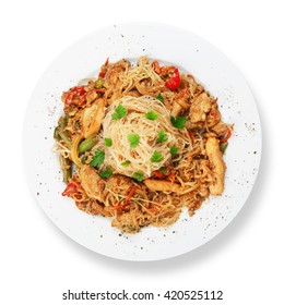 Asian Food. Fried Thai Rice Noodles With Meat And Vegetables. Chinese Rice Vermicelli With Meat, Parsley And Peppers. Top View, Flat Lay, Isolated