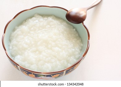 Asian Food, Plain Rice Porridge With Wooden Spoon