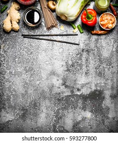 Asian Food. A Variety Of Ingredients For Cooking Asian Food On Rustic Background.