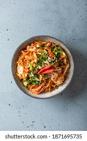 Asian Food, Wok Noodle And Vegetables In Ceramic Bowl, Top View