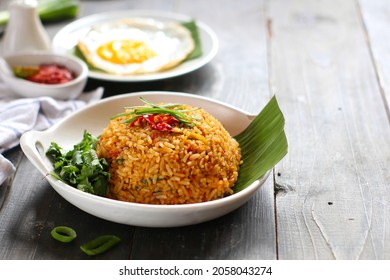 Asian Fried Rice, Nasi Goreng served with soya sauce, chilli paste.