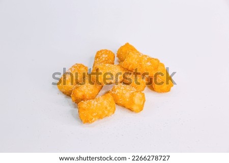 Asian Fried Sweet Potato Gems with White Sugar on a White Background