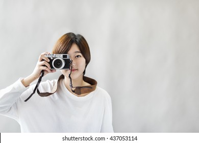 Asian Girl Camera Photographer Focus Shooting Concept - Powered by Shutterstock