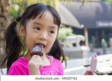 Asian Chinese Little Girl Eating Ice Stock Photo 669309046 | Shutterstock