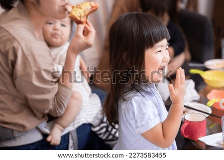 Asian girl enjoying her meal