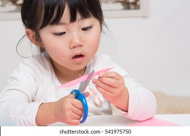 Asian Girl Enjoys Craft Work