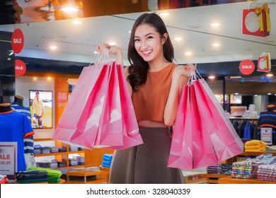 Asian Girl Happy Enjoy Shopping In Department Store