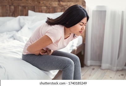 Asian Girl Having Abdominal Pain Touching Stock Photo 1740185249 ...