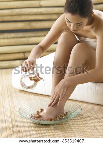 Asian girl having a footbath