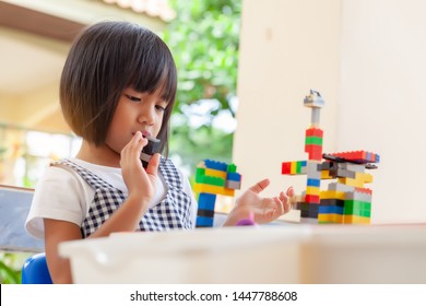 Asian Girl Kid Play Lego Or Toy, Asian Girls Relax With Playing Blocks, Asian Girls Enjoy Playing Toys.