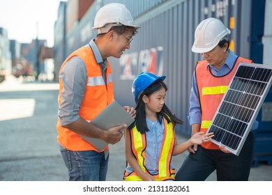 Asian Girl Learning The Technology Engineering Of Renewable Solar Cell . Engineers Meeting Checking And Inspecting. Concept Of Renewable Energy Working. Specialists Testing Photovoltaic Cells Module.